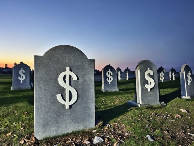Graveyard-with-dollar-signs.jpg