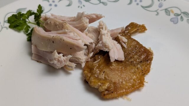 sous-vide-turkey-breast-and-oven-roasted-skin-on-white-plate.jpg